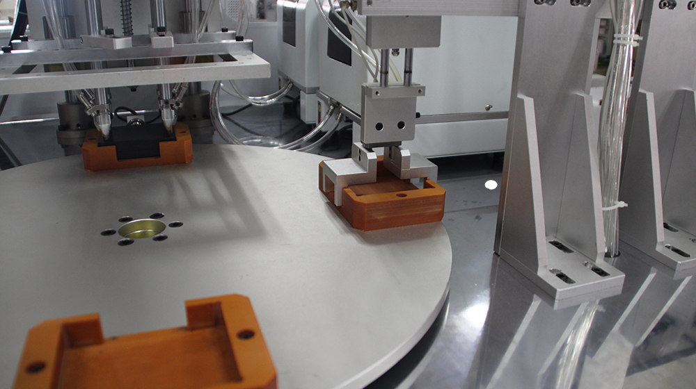 Rotary multi head screw machine